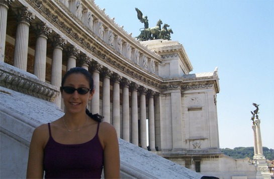 Rachel on the monument. Notice the great bronze statues of horse drawn chariots.