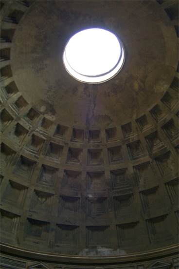 The Pantheon.  Actually the rotunda inside the Pantheon.  The Emperor Hadrian designed the Pantheon in AD 120.  Supposedly the largest dome ever built until 1960, but I'm not sure if this is correct as we were in some other large domes.