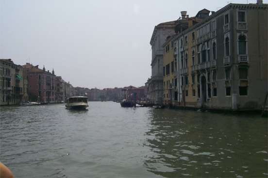 ... Buses going by picking up the passengers. ...