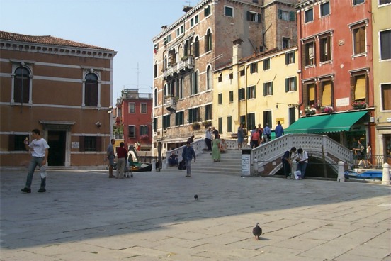 Towards our last evening.  We stopped in this square to listen to an itinerant musician.  The pigeon appears to be coming for me.