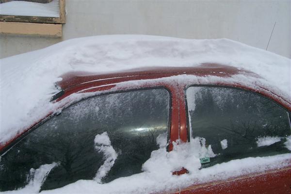 and on them.  I had heard it in the night, an avalanche from the roof of the building.