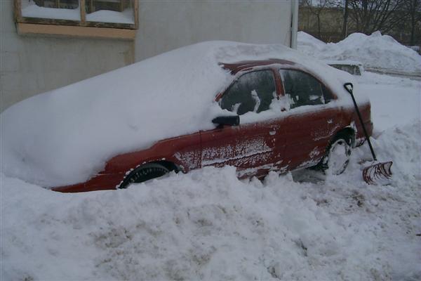 It didn't phase me until I uncovered my car and could see that the roof had been dented severly