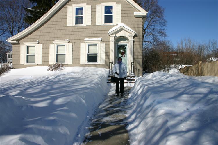 The snow was a few inches from the windows