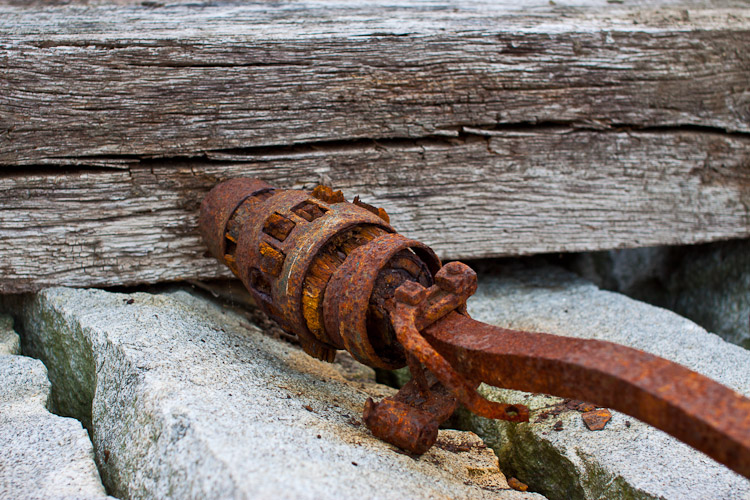 An old wagon wheel axle
